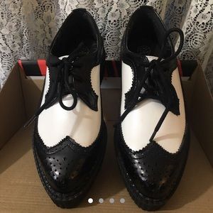 T.U.K. Shoes black and white wingtip creepers